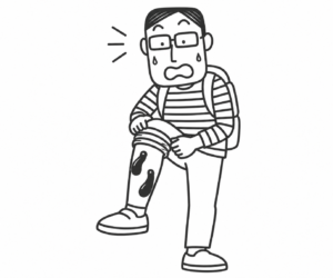 膝の傷から黒い液体がにじむ人物