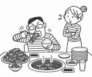 大きな肉料理を食べる人物